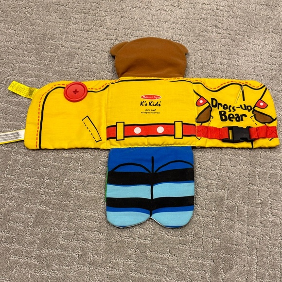 Melissa & Doug Soft Activity Baby Book - Dress Up Bear - Picture 2 of 3